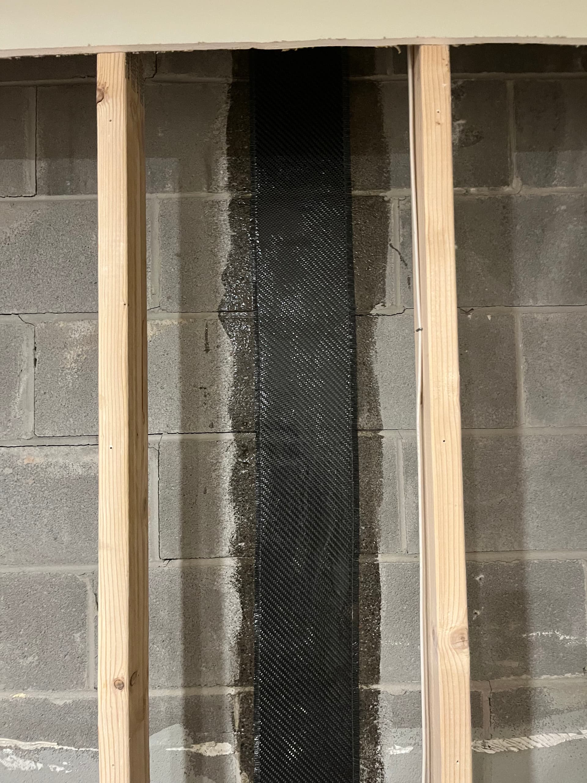 Gallery photos for Carbon Fiber Strap Installation on a Cracked Block Wall in Buford: Image #1